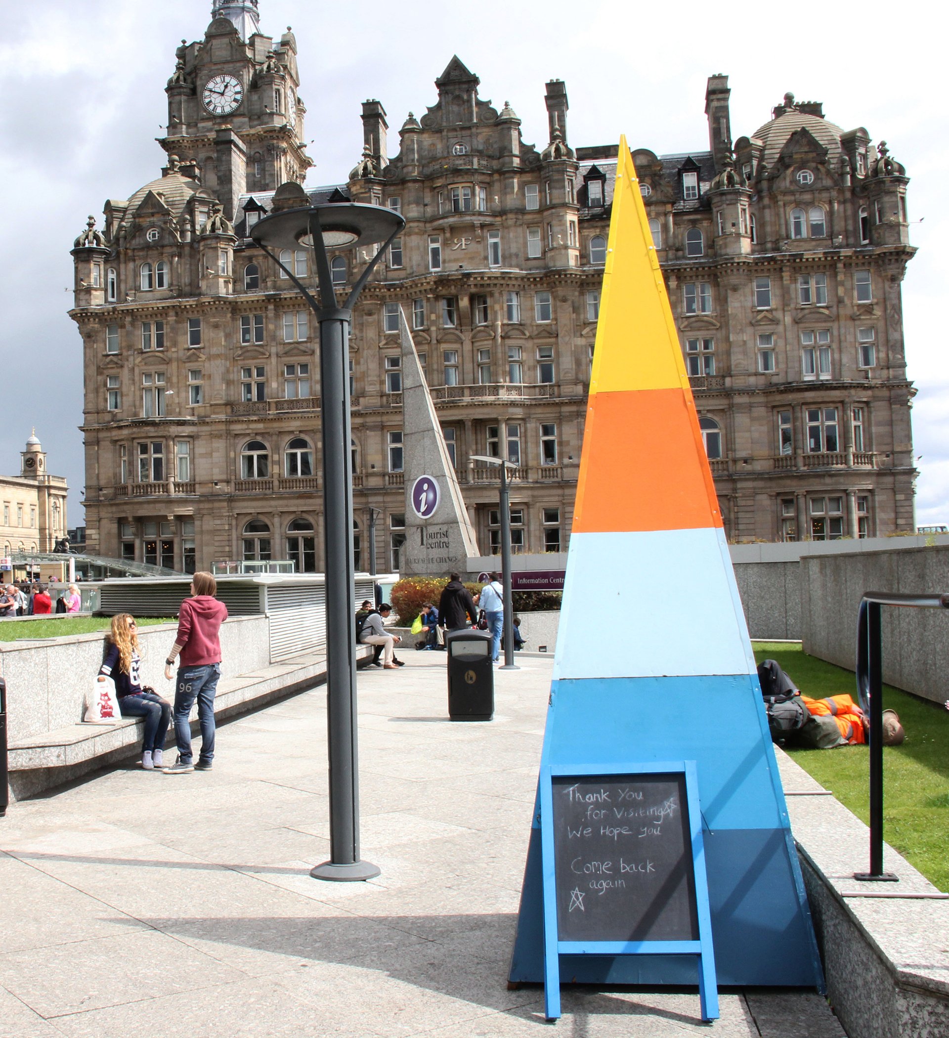 BoxSmall wooden pyramid structure painted with bright colours
