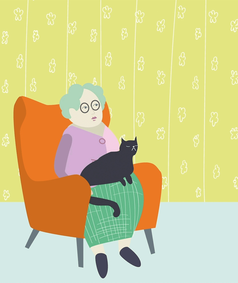 Granny sitting in an orange armchair with a black cat